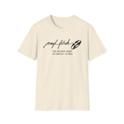 Cream t-shirt with black "vinyl fetish" graphic and Los Angeles address.