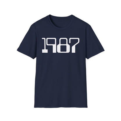 Navy t-shirt with white "1987" graphic text centered on chest.
