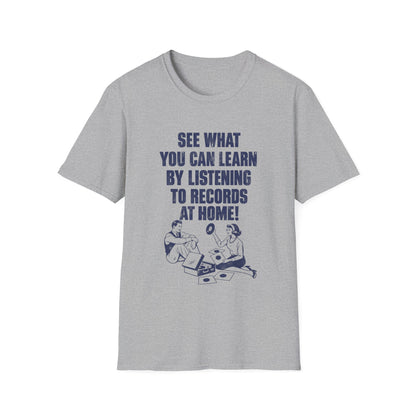 Grey t-shirt with text "See what you can learn by listening to records at home!" and vintage couple illustration.