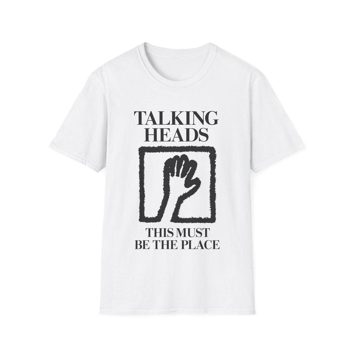 White t-shirt with "Talking Heads This Must Be The Place" and a hand graphic.