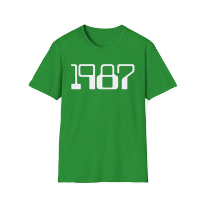 Green t-shirt with the year 1987 printed in white.