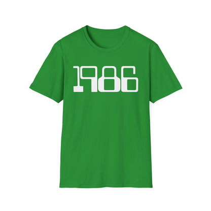 Green t-shirt with white text reading "1986"