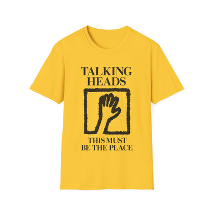 Yellow t-shirt with black "Talking Heads" text and hand graphic.