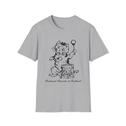 Grey t-shirt with black line drawing of a cat playing a drum and holding a ball on a stick.