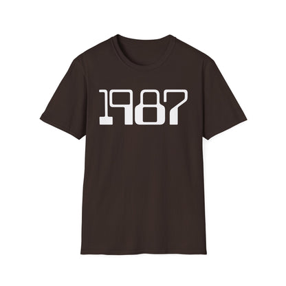 Brown t-shirt with white text "1987" across the chest.